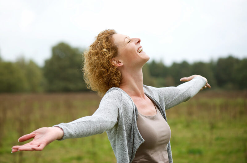 Portrait,of,a,happy,middle,aged,woman,enjoying,life